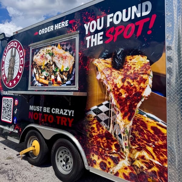 El Burro Loco food truck with large graphics of cheesy quesadillas and burritos, under a blue sky.